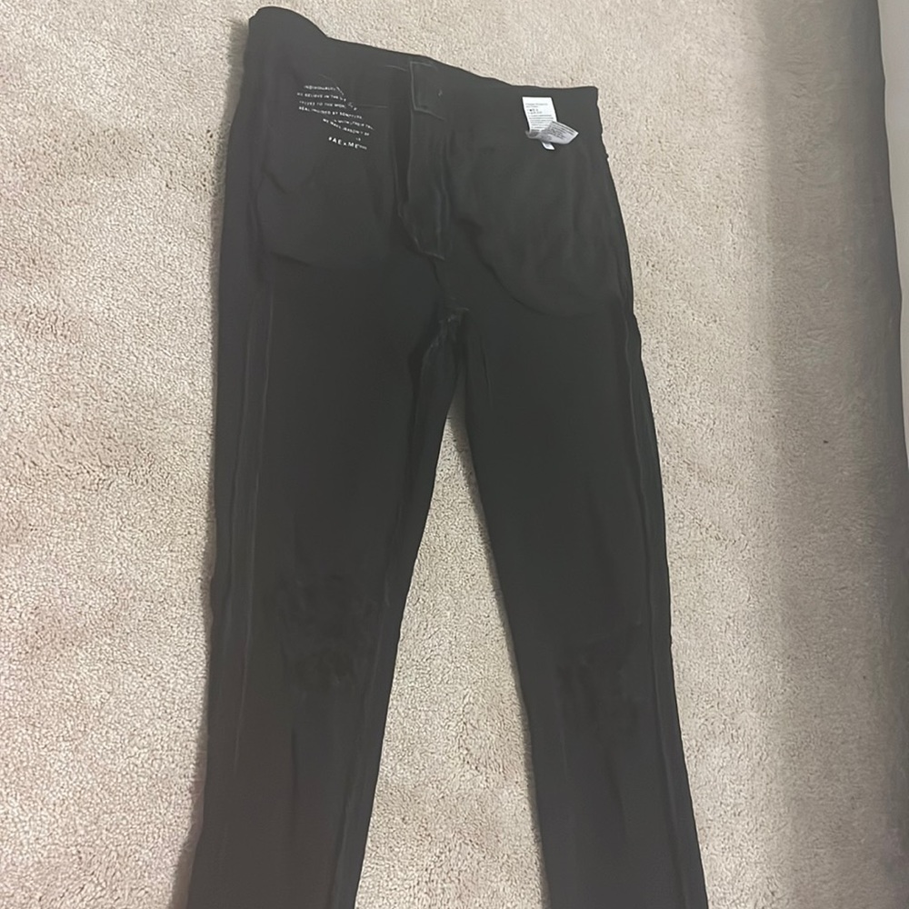 Women’s black skinny jeans WITH RIPS